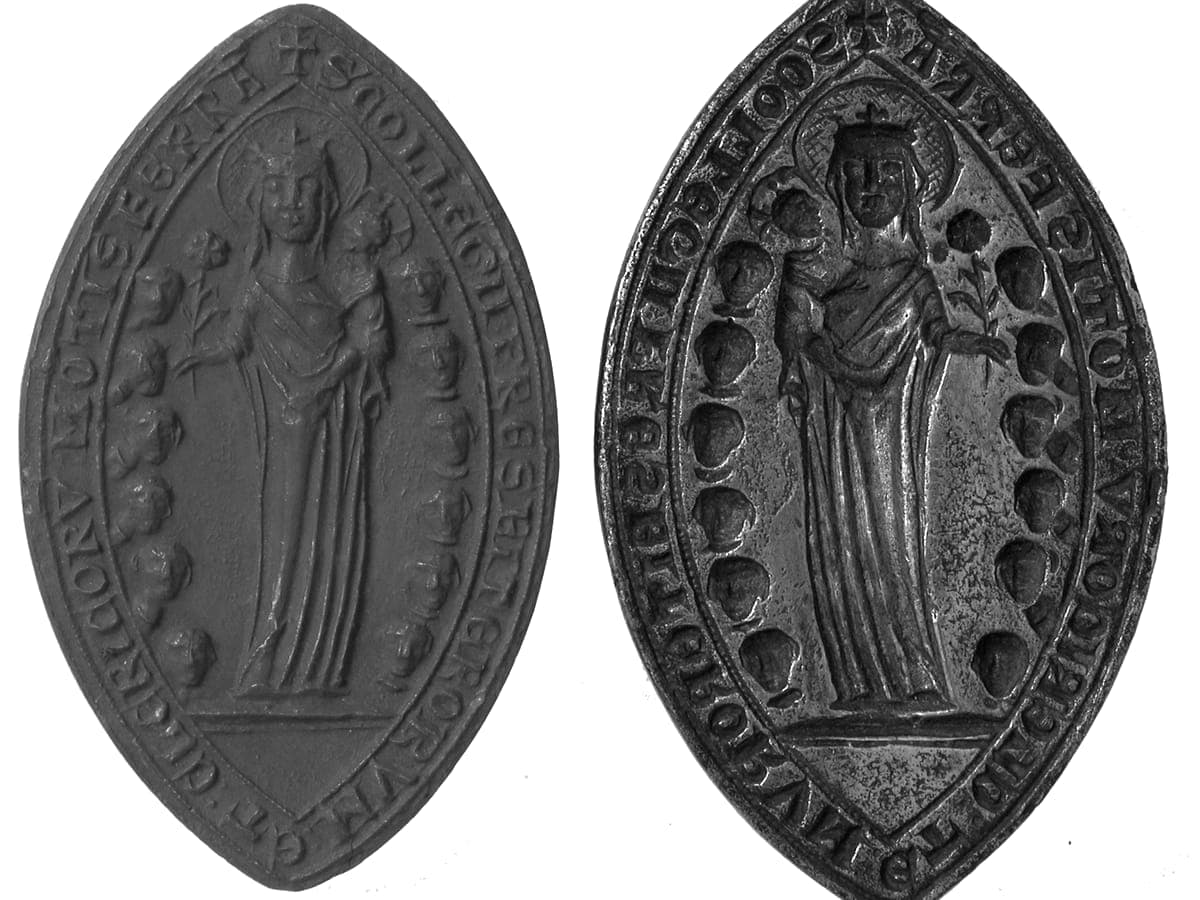 A pointed oval wax seal impression beside the bronze matrix that made it